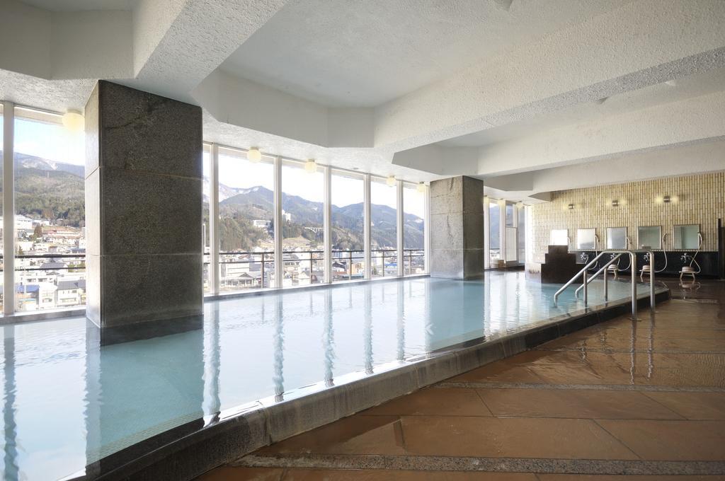 Suimeikan Геро Екстериор снимка The indoor pool at the hotel